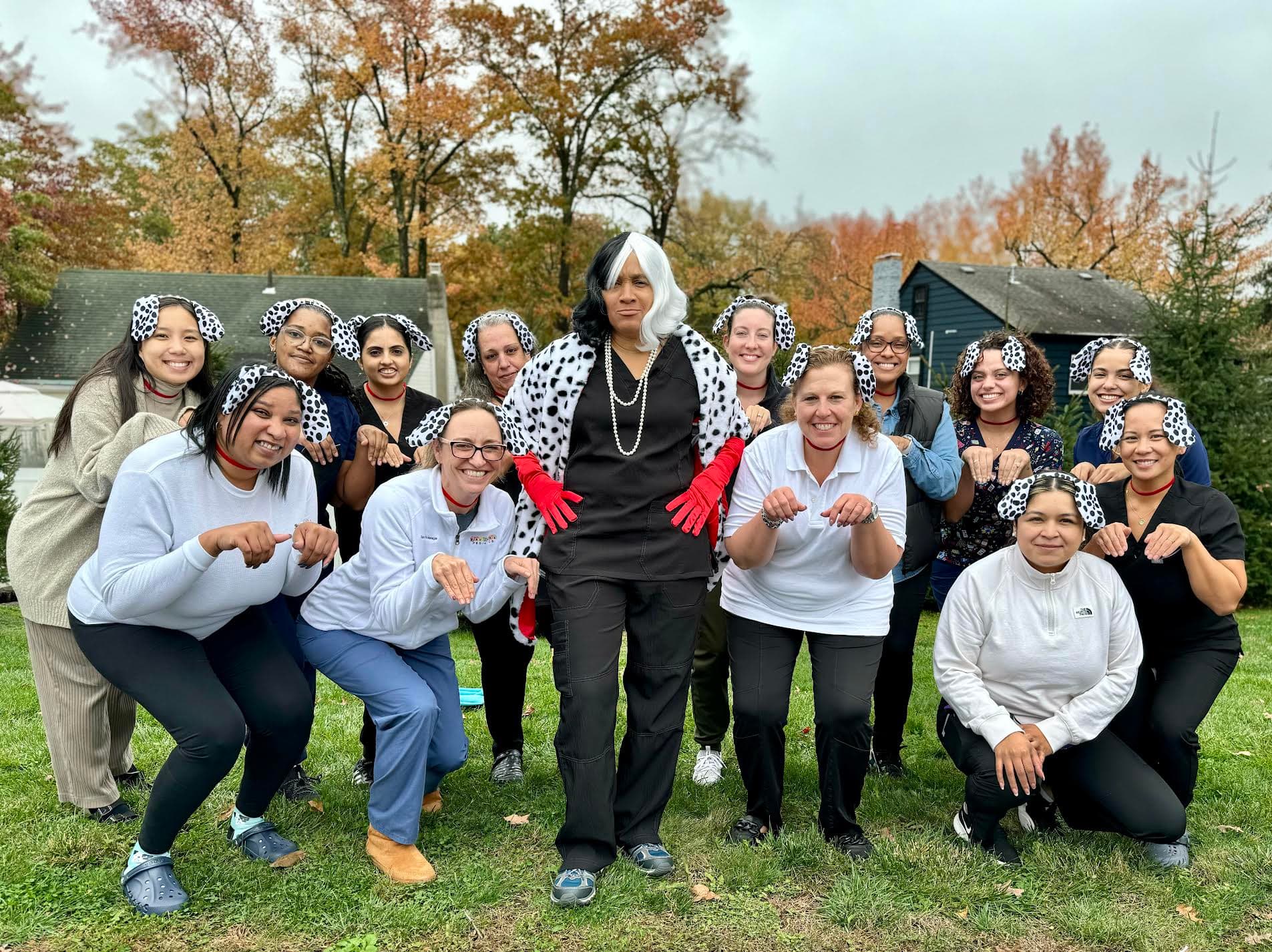 Fanwood office staff in dalmatian costumes for Halloween